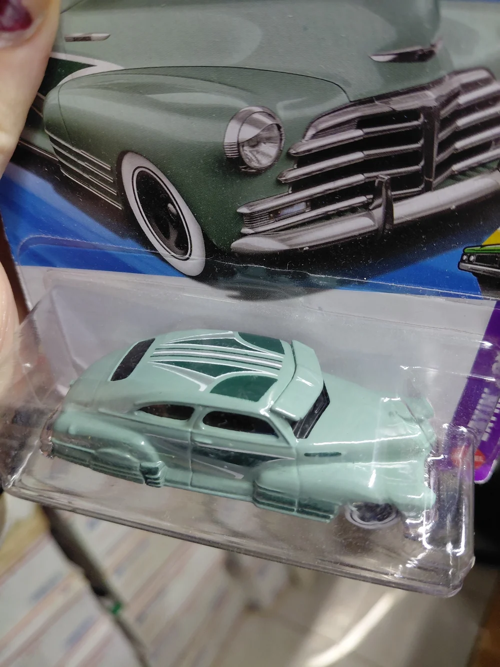 is the Hot Wheels '47 Chevy Fleetline in turquoise/green from the Layin' Low ser